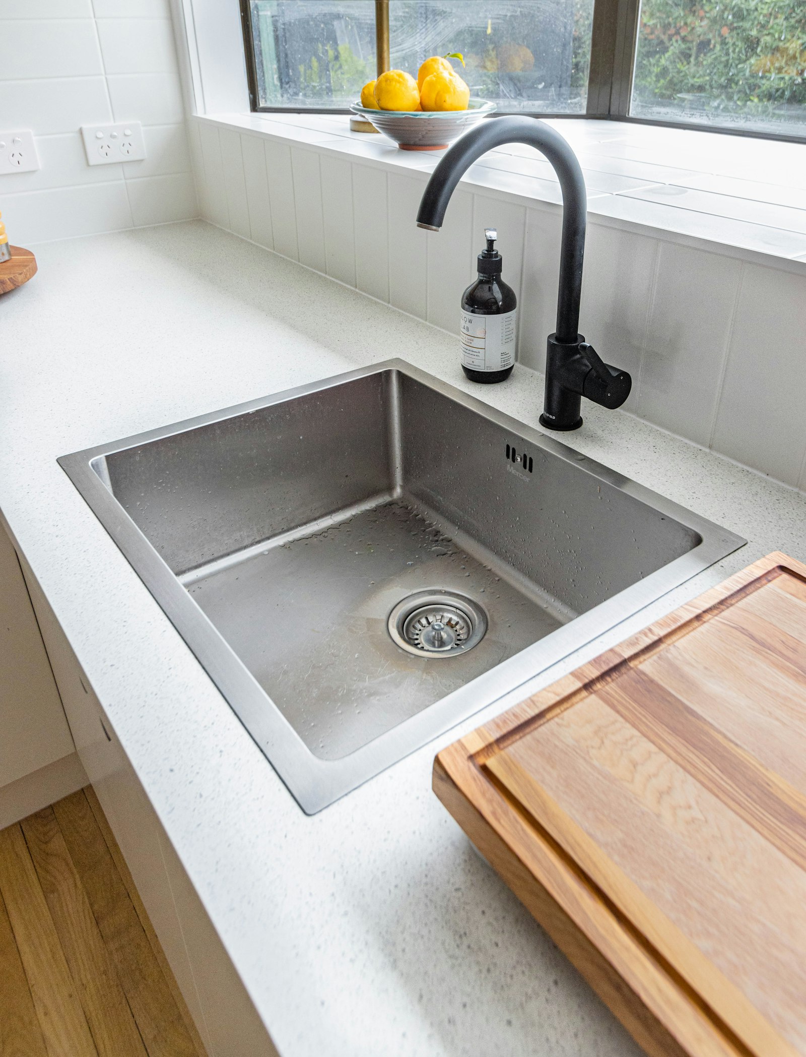 A modern kitchen sink and faucet